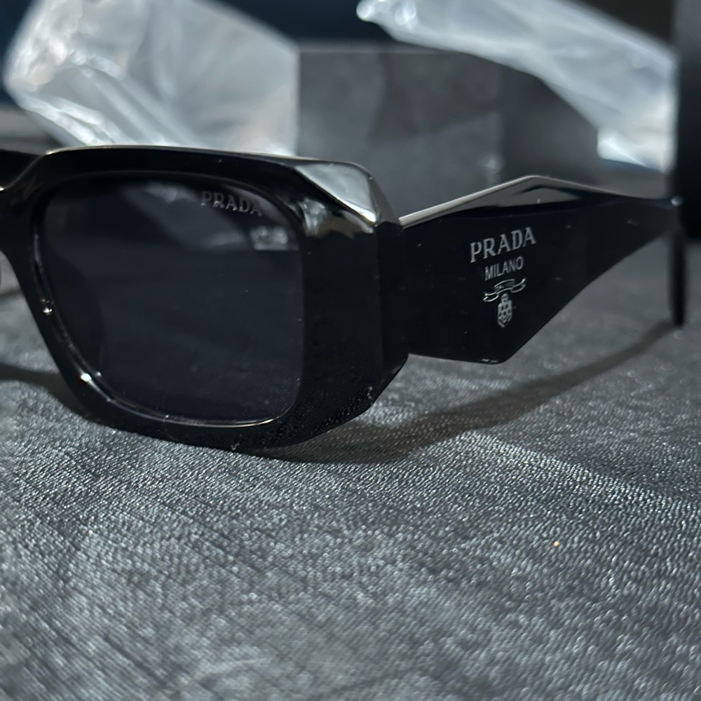 Prada symbol glasses